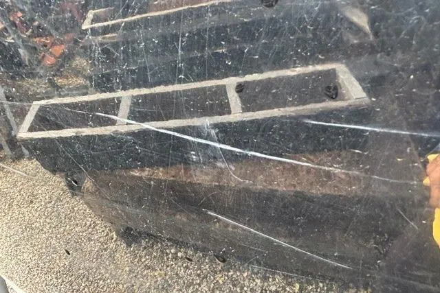 Slide: The Image of Scratched surface of a 2021 Chaparral 21 SSi boat, showing wear and tear. - 26