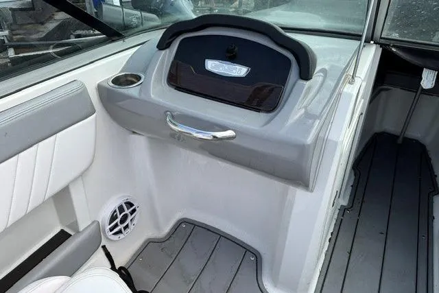 Slide: The Image of Interior of a 2021 Chaparral 21 SSi boat, featuring sleek design and modern amenities. - 33