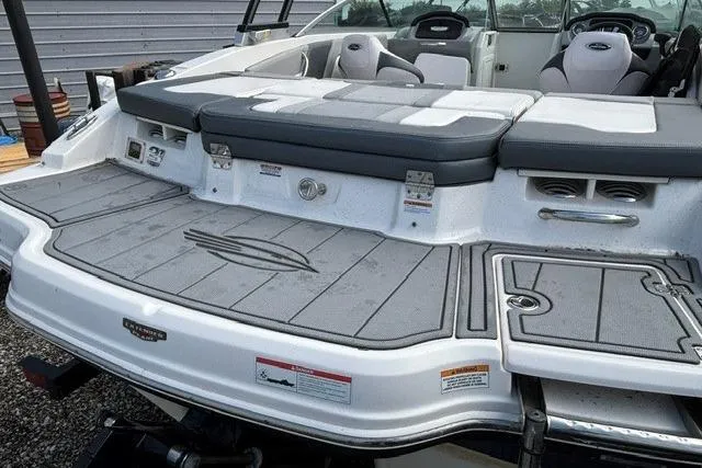 Slide: The Image of 2021 Chaparral 21 SSi boat with spacious rear deck and seating area. - 9