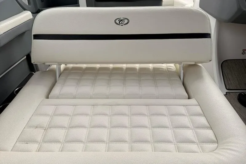 Slide: The Image of 2018 Cobalt R5 WSS Surf boat interior with white cushioned seating. - 25