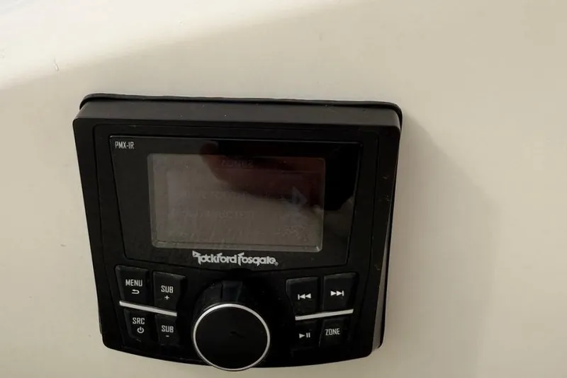 Slide: The Image of Rockford Fosgate PMX-1R audio control panel on 2018 Cobalt R5 WSS Surf boat. - 28