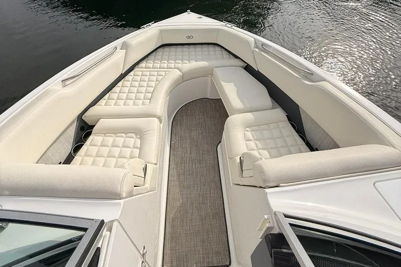 Slide: The Image of Luxurious seating on 2018 Cobalt R5 WSS Surf boat, featuring elegant white upholstery. - 31