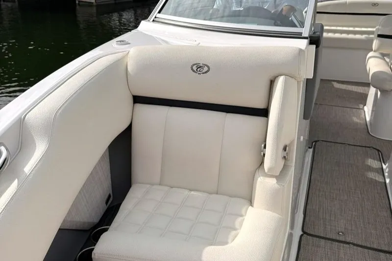 Slide: The Image of Luxurious seating on a 2018 Cobalt R5 WSS Surf boat, featuring elegant white upholstery. - 32