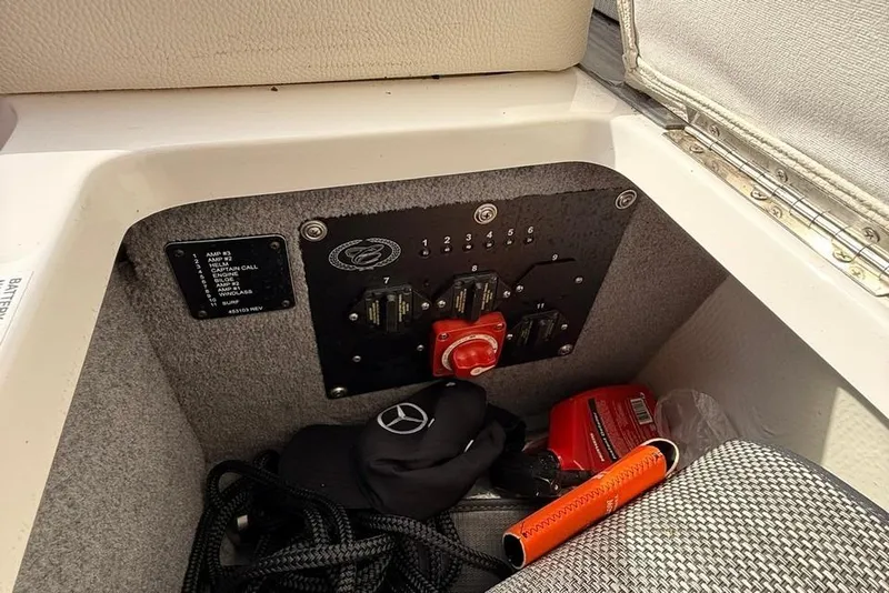 Slide: The Image of Control panel of a 2018 Cobalt R5 WSS Surf boat with accessories. - 40