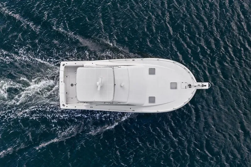 Slide: The Image of Aerial view of 2005 Luhrs 38 Convertible yacht cruising on open water. - 14