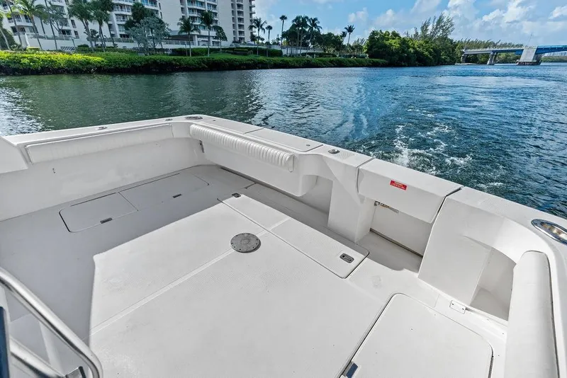 Slide: The Image of Spacious deck of 2005 Luhrs 38 Convertible yacht on a scenic waterway. - 27