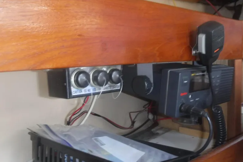 Slide: The Image of 1975 Carter 3/4 Ton vehicle dashboard with vintage radio and control panel. - 15