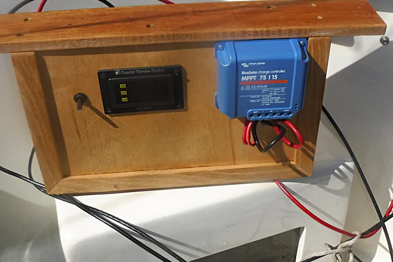 Slide: The Image of Wooden panel with Coastal Climate Control and BlueSolar charge controller, Carter 3/4 Ton, 1975. - 33