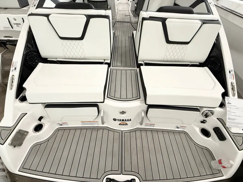 Slide: The Image of Yamaha Boats 252SD 2025, luxurious deck design with white seating. - 2