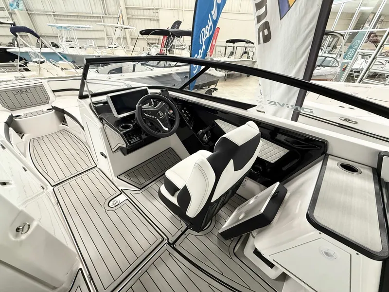 Slide: The Image of Interior of 2025 Yamaha Boats 252SD featuring modern cockpit design. - 3