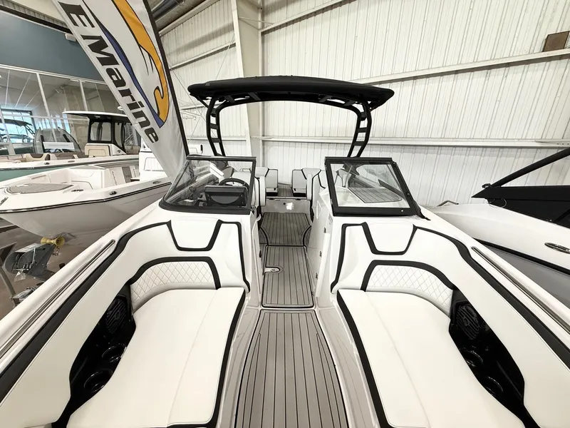 Slide: The Image of Interior view of 2025 Yamaha Boats 252SD with luxurious seating. - 7
