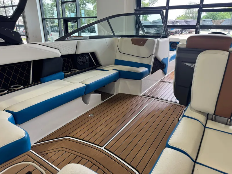 Slide: The Image of Interior of 2019 Nautique Super Air Nautique GS22 with luxurious seating. - 14