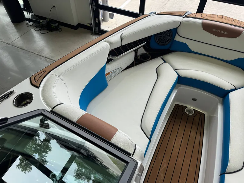Slide: The Image of Interior of a 2019 Nautique Super Air Nautique GS22 boat. - 19
