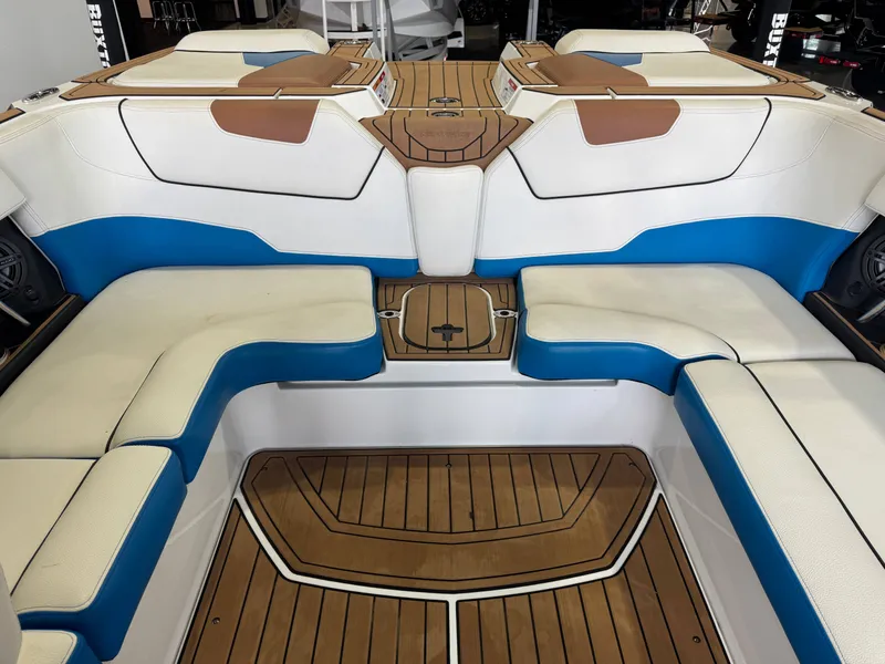 Slide: The Image of Interior of 2019 Nautique Super Air Nautique GS22 with blue and white seating. - 27