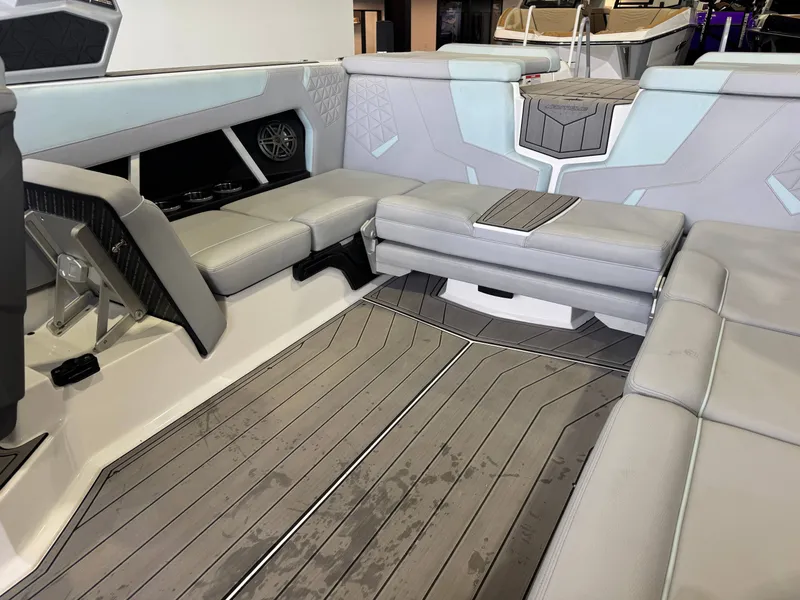 Slide: The Image of Interior of 2023 Nautique Super Air Nautique GS22 with gray upholstery. - 15