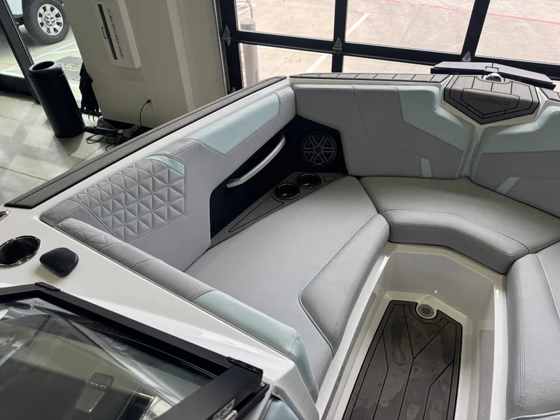 Slide: The Image of Interior of 2023 Nautique Super Air Nautique GS22 with gray upholstery. - 19