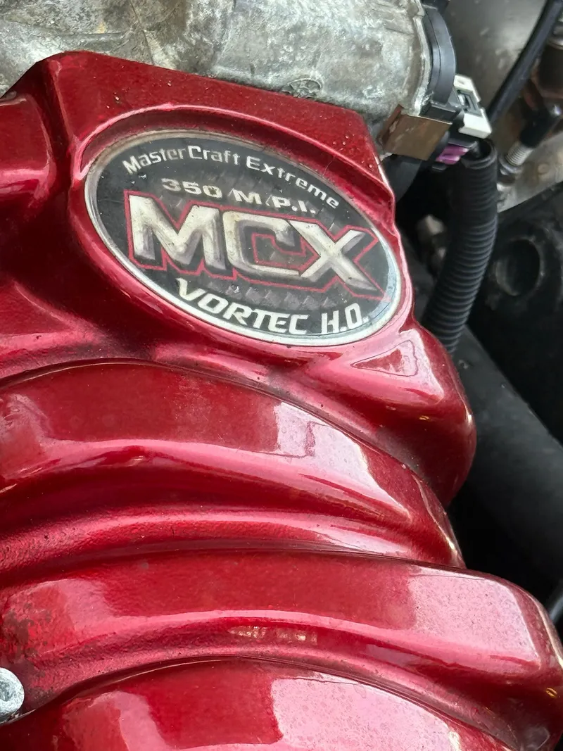 Slide: The Image of MasterCraft X-2 2011 engine cover with MCX Vortec H.O. logo. - 18
