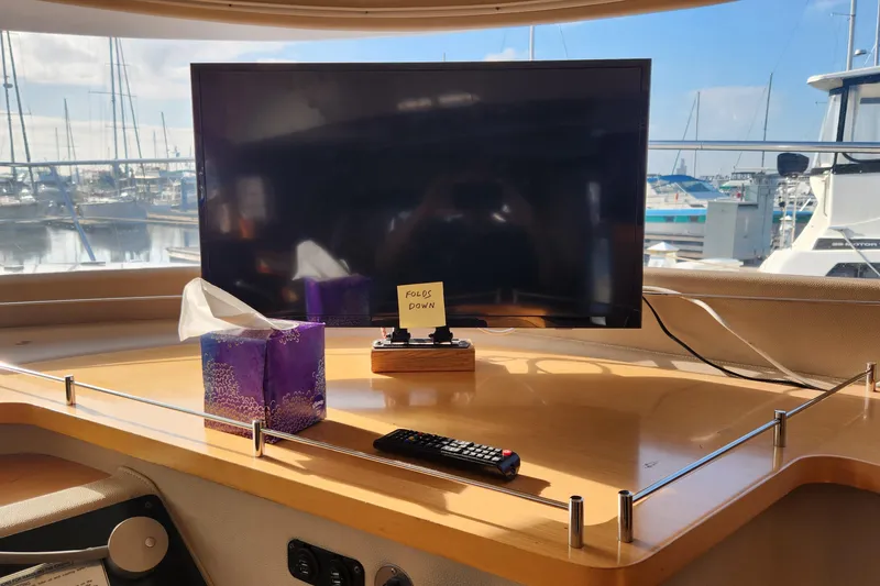 Slide: The Image of Interior of 2013 Fountaine Pujut Summerland 40 yacht with TV and tissue box. - 12