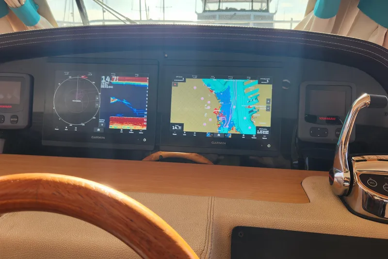Slide: The Image of Cockpit of 2013 Fountaine Pajot Summerland 40 with Garmin navigation displays. - 14