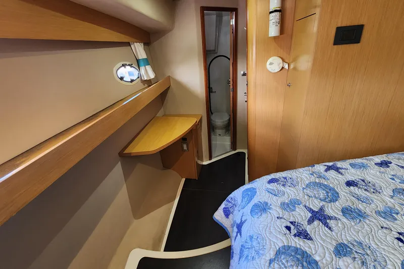 Slide: The Image of Interior of 2013 Fountaine Pujut Summerland 40 yacht cabin with bed and bathroom. - 22