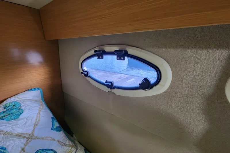 Slide: The Image of Cabin interior of 2013 Fountaine Pujut Summerland 40 with porthole view. - 25
