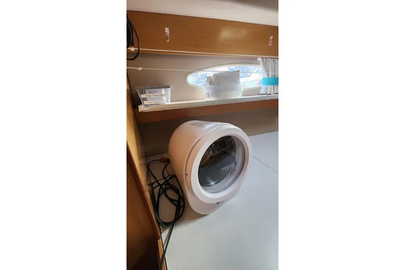 Slide: The Image of Compact Morus dryer inside 2013 Fountaine Pujut Summerland 40 boat cabin. - 29