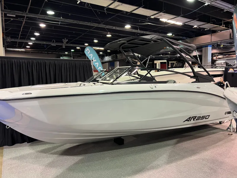The Image of 2025 Yamaha AR250 boat displayed at a show. - 0
