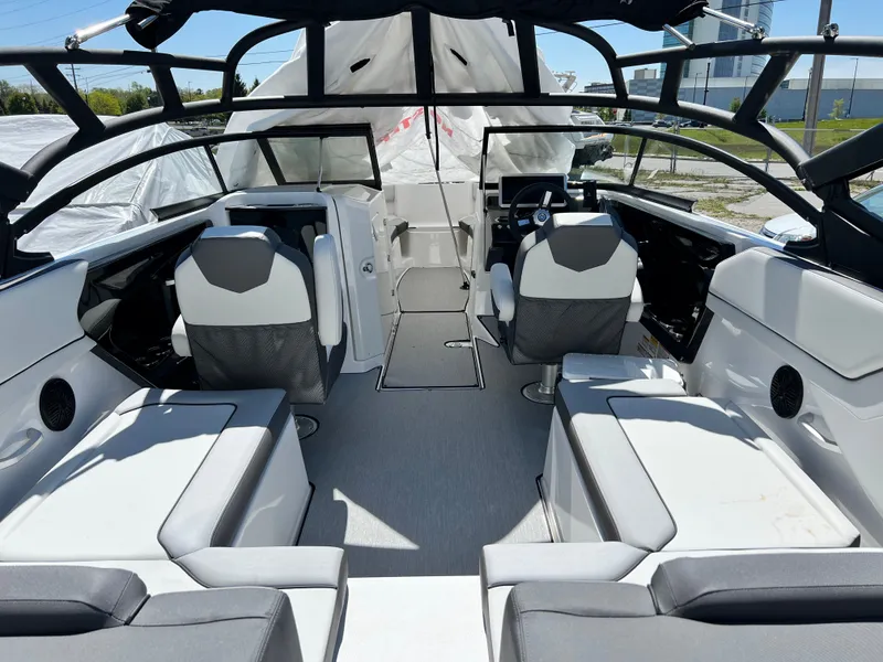 Slide: The Image of Interior of 2025 Yamaha AR250 boat with modern seating. - 11