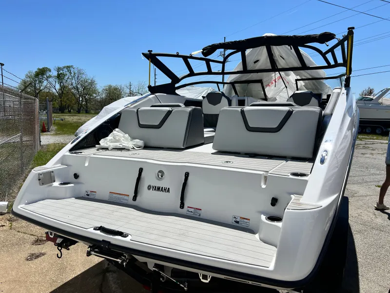 Slide: The Image of Rear view of a 2025 Yamaha AR250 boat outdoors. - 12