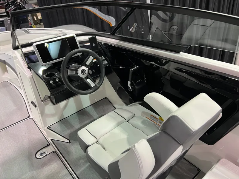 Slide: The Image of Interior of 2025 Yamaha AR250 boat with modern helm station. - 5