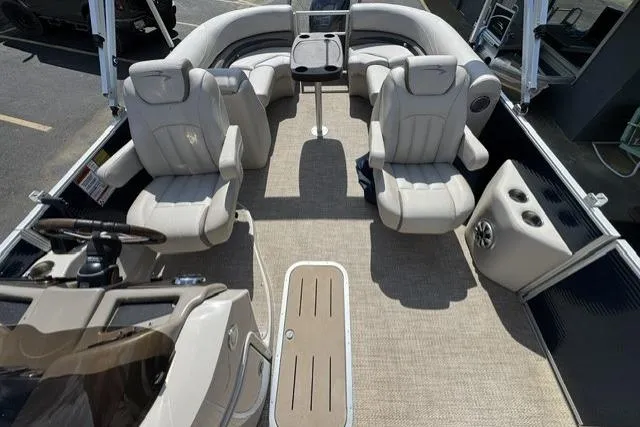 Slide: The Image of 2018 Bennington 22 GSR boat interior with plush seating and modern console design. - 7