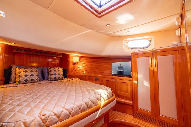 Slide: The Image of Luxurious cabin interior of 2008 Grand Banks 45 Eastbay SX yacht with elegant wood finish. - 20