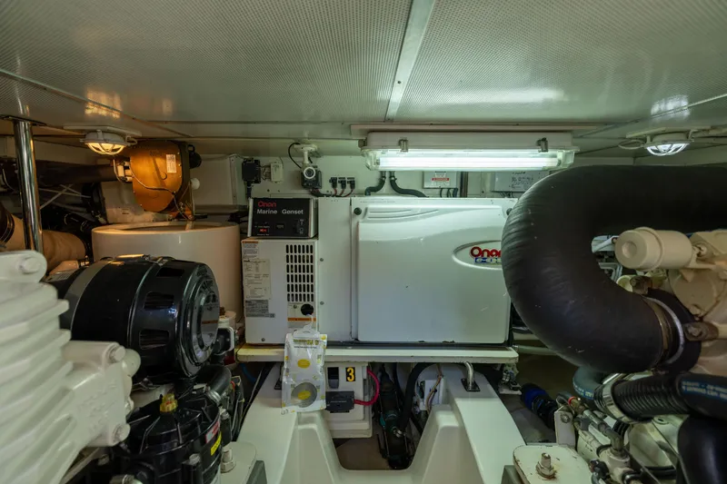 Slide: The Image of Engine room of 2008 Grand Banks 45 Eastbay SX with Onan Marine Genset. - 22