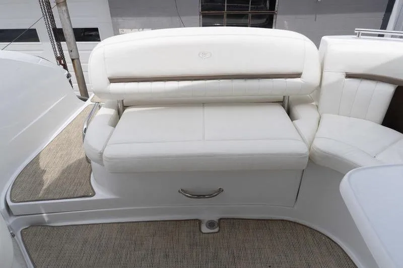 Slide: The Image of White leather seating on a 2007 Cobalt 323 boat, featuring elegant design and comfort. - 31