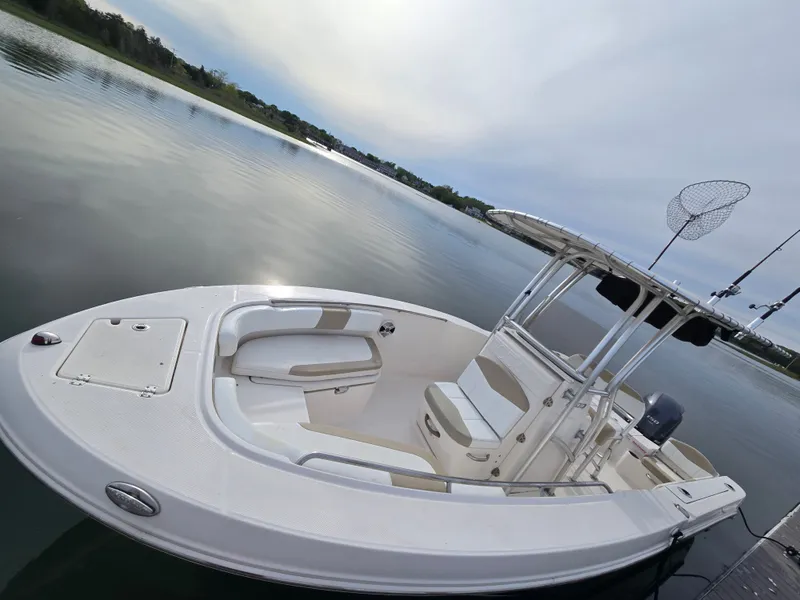 Slide: The Image of 2018 Robalo R200 Center Console on calm water. - 4