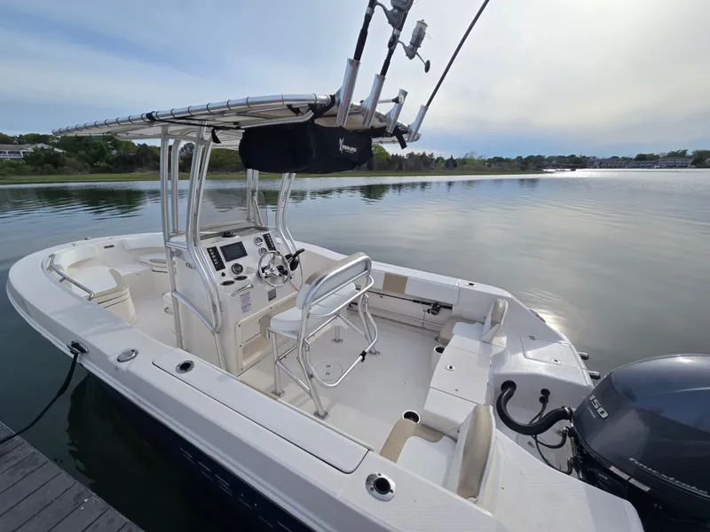 Slide: The Image of 2018 Robalo R200 Center Console boat on calm water. - 5
