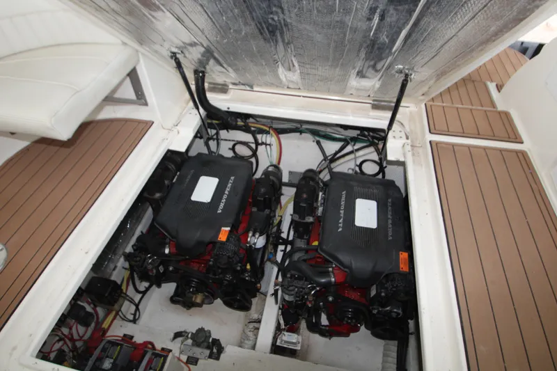 Slide: The Image of Engine compartment of 2003 Cruisers Yachts 320 Express with twin Volvo Penta engines. - 27