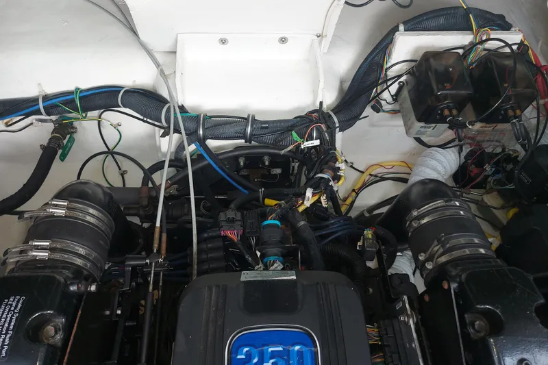 Slide: The Image of Engine compartment of a 2008 Maxum 2700 SE boat, showing wiring and components. - 40