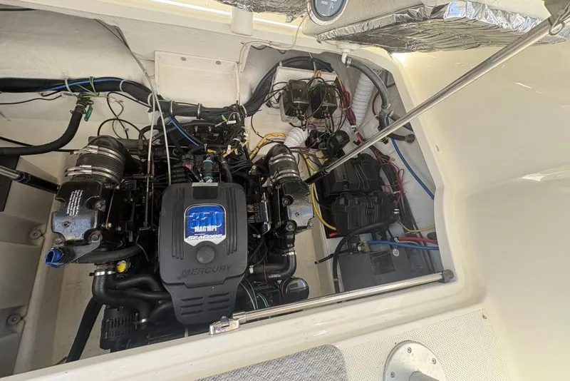 Slide: The Image of Engine compartment of a 2008 Maxum 2700 SE boat with Mercury 350 MAG MPI engine. - 62