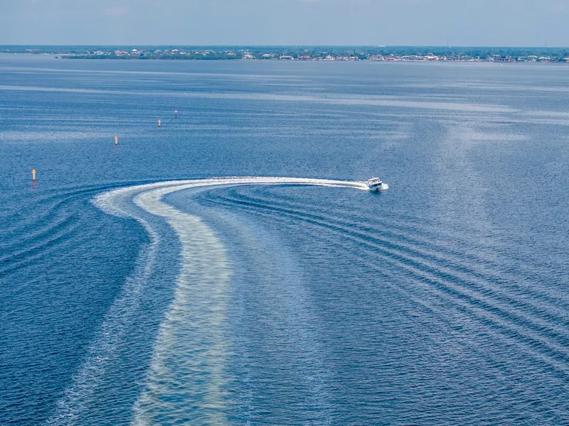 Slide: The Image of Aerial view of 2019 Boston Whaler 420 Outrage cruising on open water. - 27
