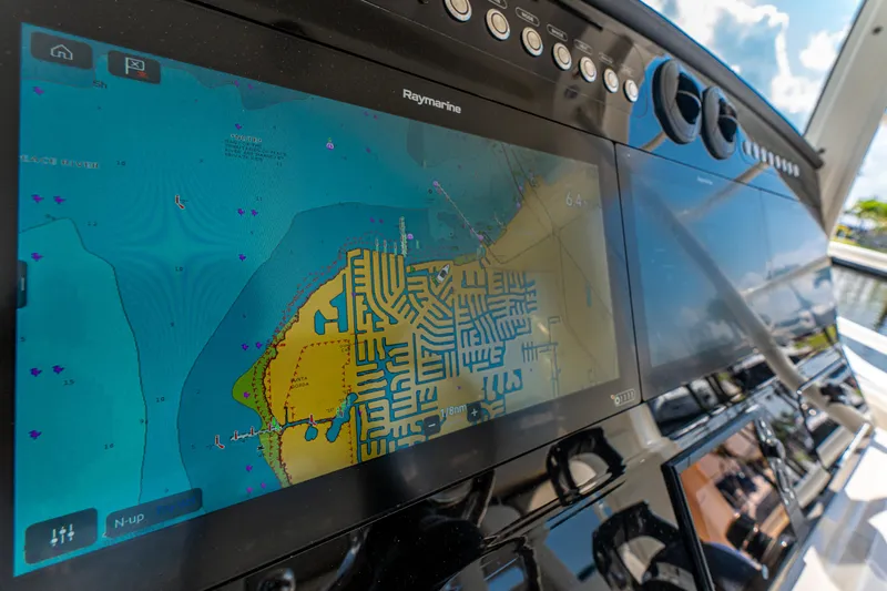 Slide: The Image of Navigation system on 2019 Boston Whaler 420 Outrage boat displaying a detailed marine map. - 7