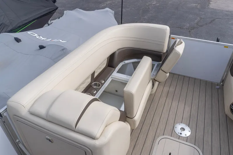 Slide: The Image of Luxurious seating area on 2026 SunCatcher Fusion 324SL boat with beige upholstery. - 17