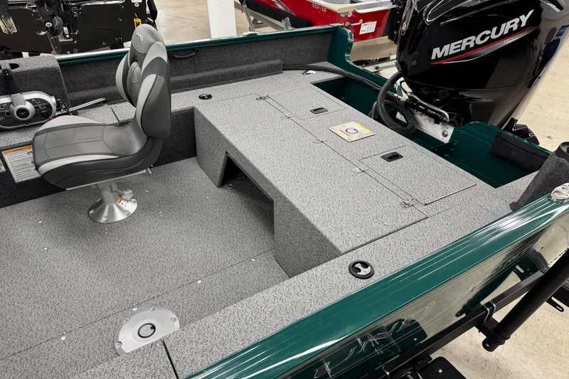 Slide: The Image of 2026 Lund 1650 Rebel XL Sport boat interior with Mercury engine and seating. - 8