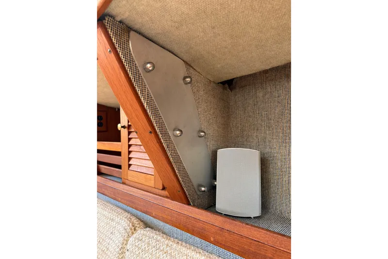 Slide: The Image of Interior of 1985 S2 11.0 meter A sailboat with speaker and wooden paneling. - 19