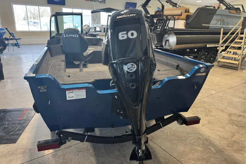 Slide: The Image of 2026 Lund 1650 Angler Sport boat with Mercury 60 engine in showroom. - 9