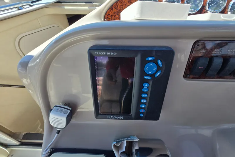 Slide: The Image of Control panel of a 2005 Sea Ray 290 Amberjack with Trackfish 6600 display. - 27