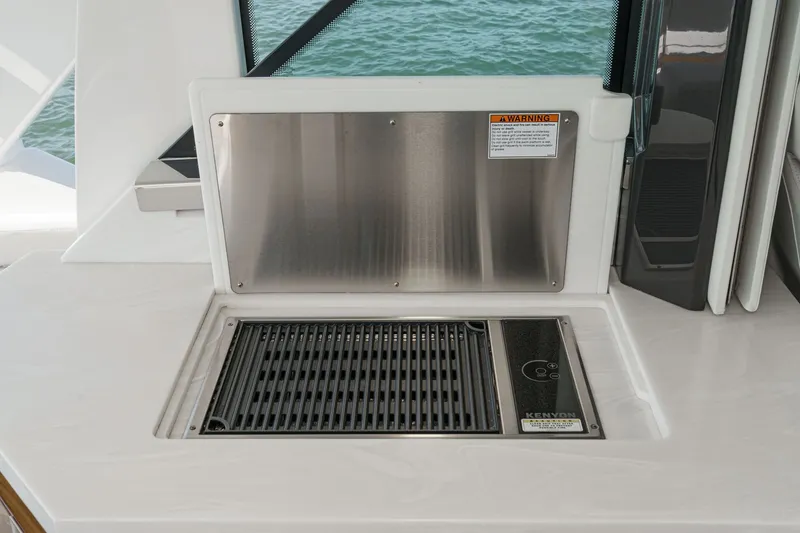 Slide: The Image of Grill area on the 2023 Tiara Yachts 48 LS. - 15