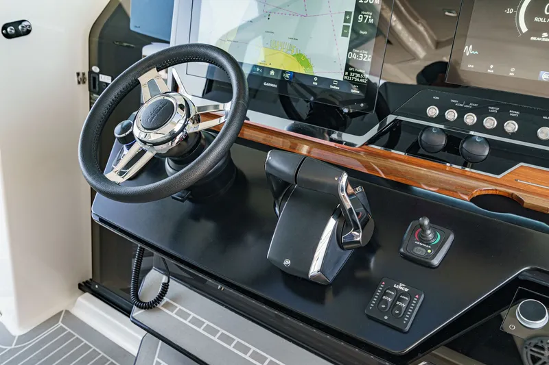 Slide: The Image of Tiara Yachts 48 LS 2023 helm with advanced navigation system. - 20
