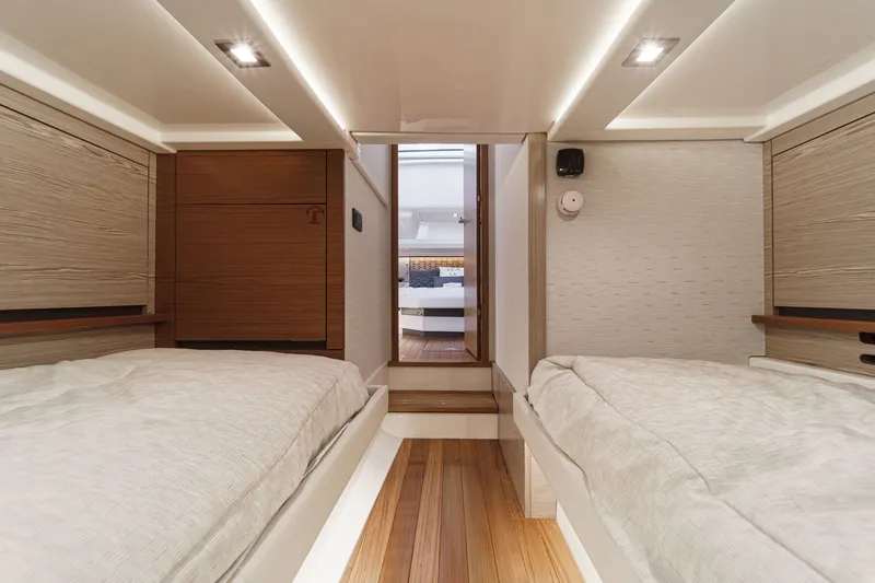 Slide: The Image of Interior of 2023 Tiara Yachts 48 LS with twin beds. - 42