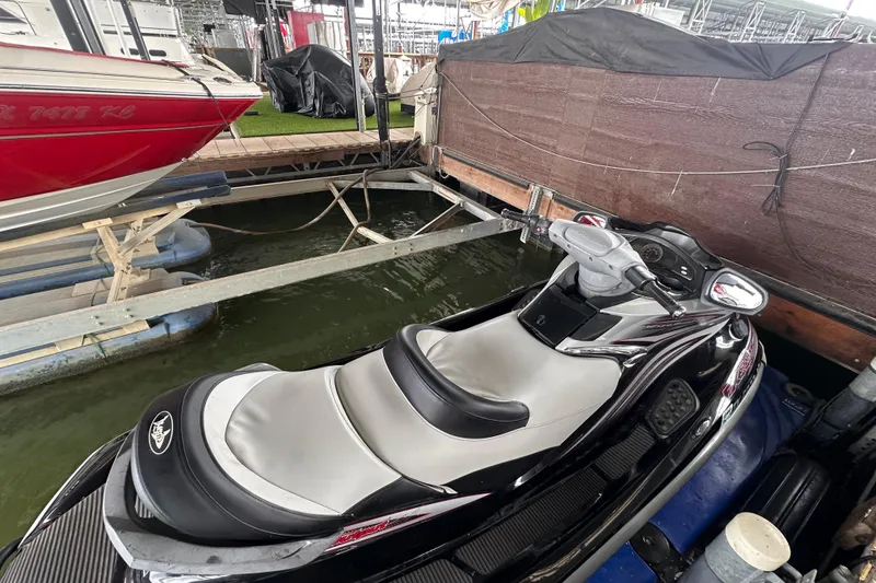 Slide: The Image of 2006 Yamaha WaveRunner FX Cruiser HO docked at marina, featuring sleek design and comfortable seating. - 10